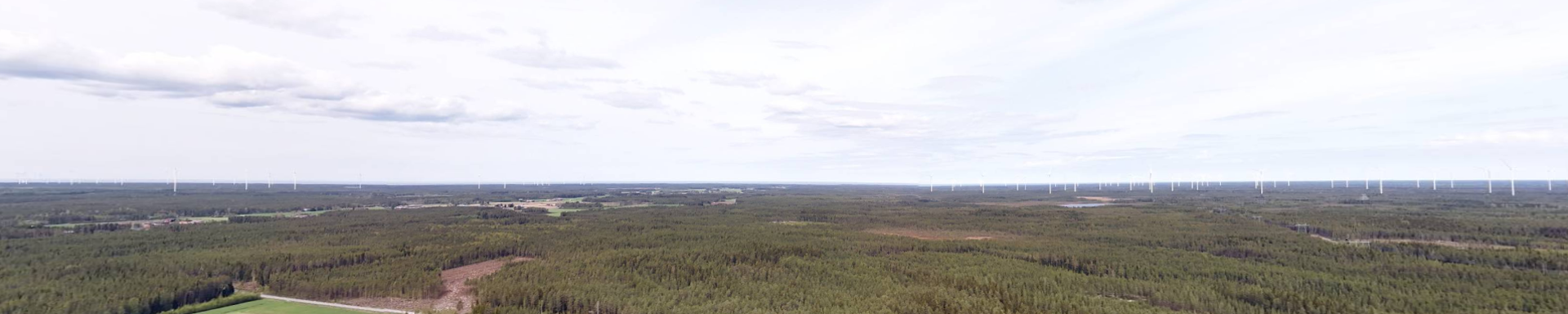 Ilmakuva Jylkän alueesta, jossa on metsää ja peltoja.