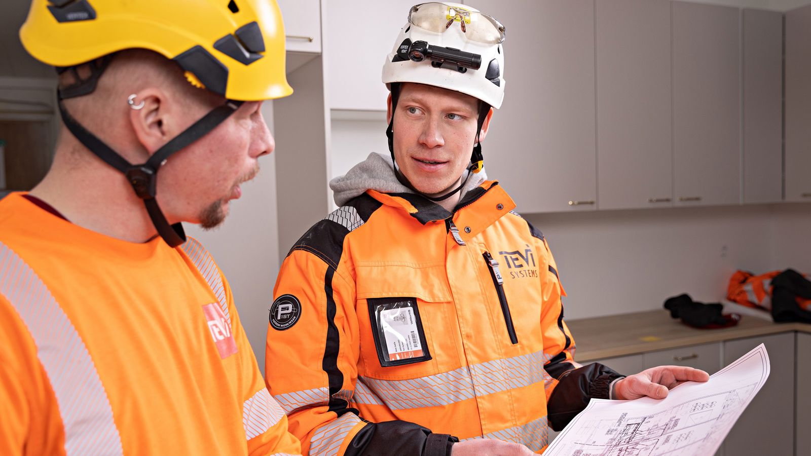 Construction workers working in their uniforms