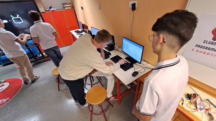students working on a PC