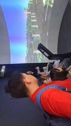 people in a projector room