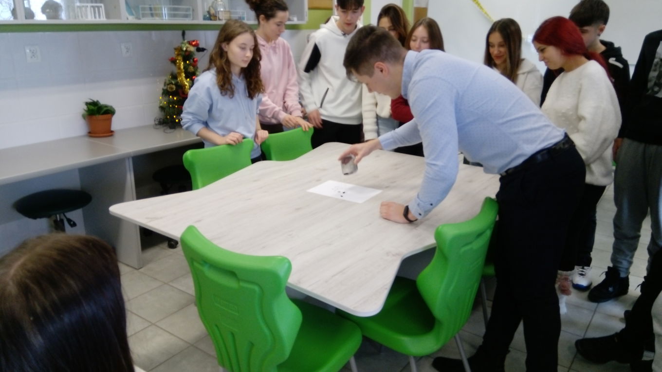 Students and a teacher working together