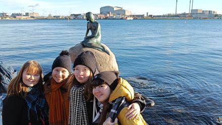 Students and the little mermaid at Copenhagen