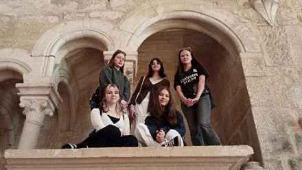 Students at a castle window