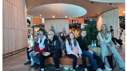 students sitting on a bench