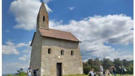 old church on a green hill