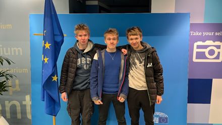 boys in front of flags