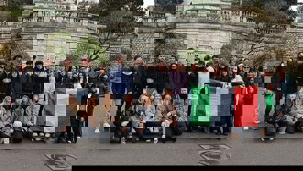 students in front of a church